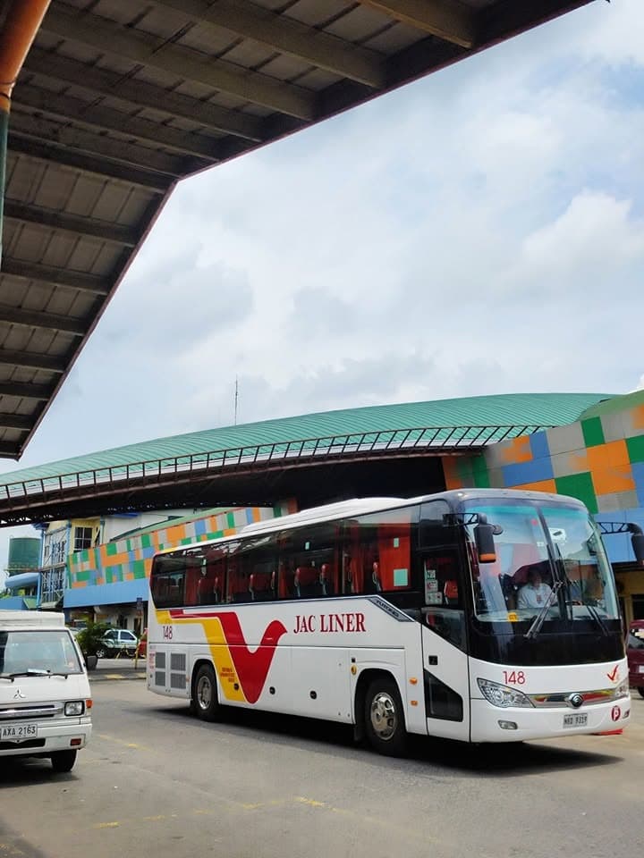 A provincial bus on the highway route toward Lucena and San Narciso