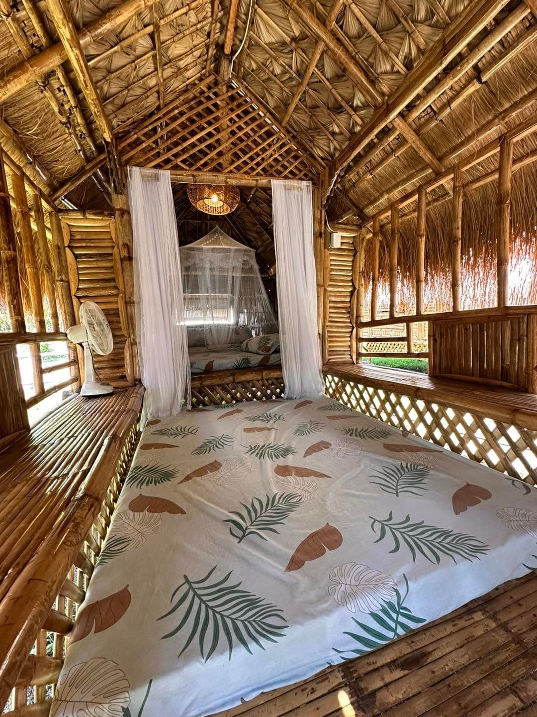 The barkada kubo, the largest bahay kubo at Paraiso, under the trees