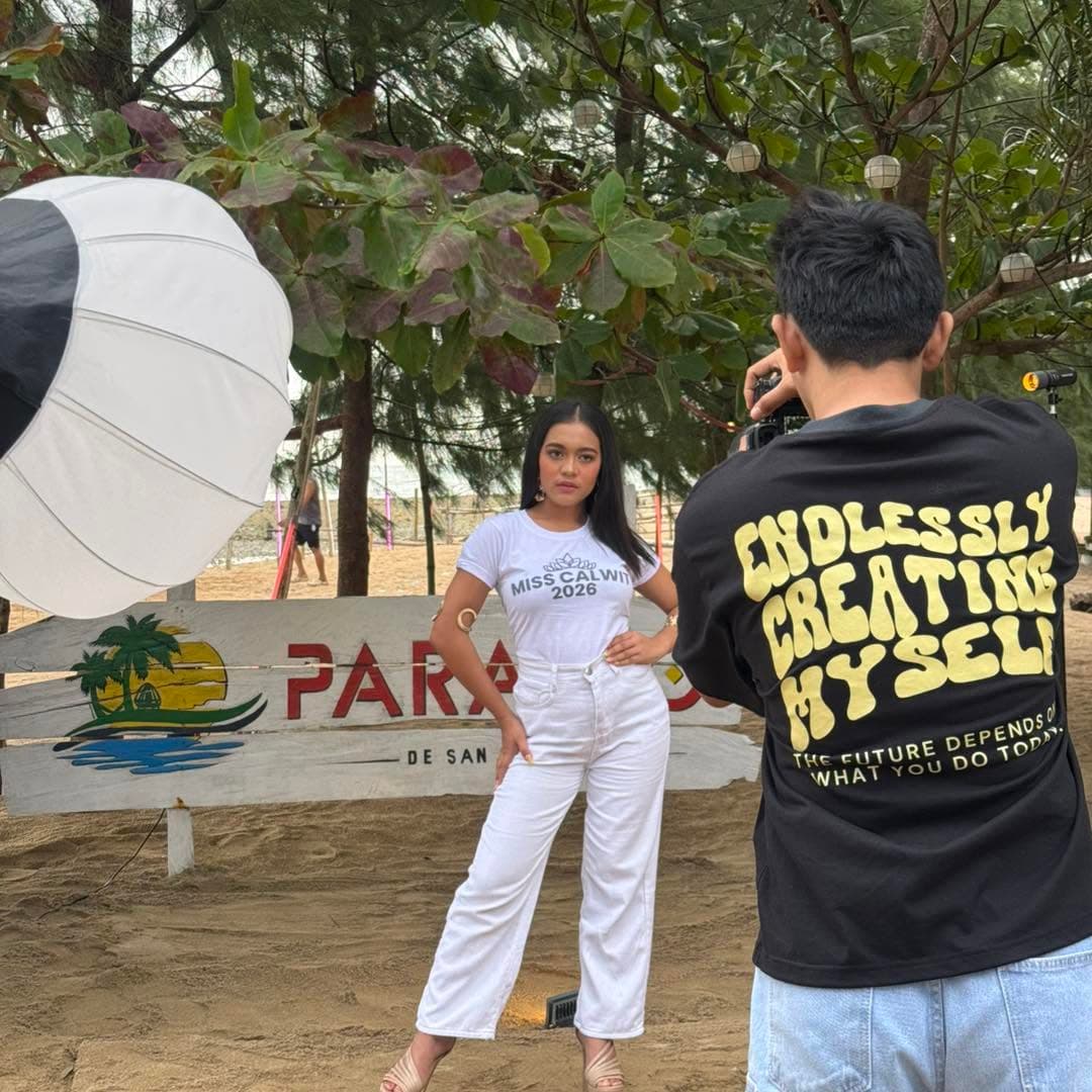 A photo shoot in progress on the beach at Paraiso